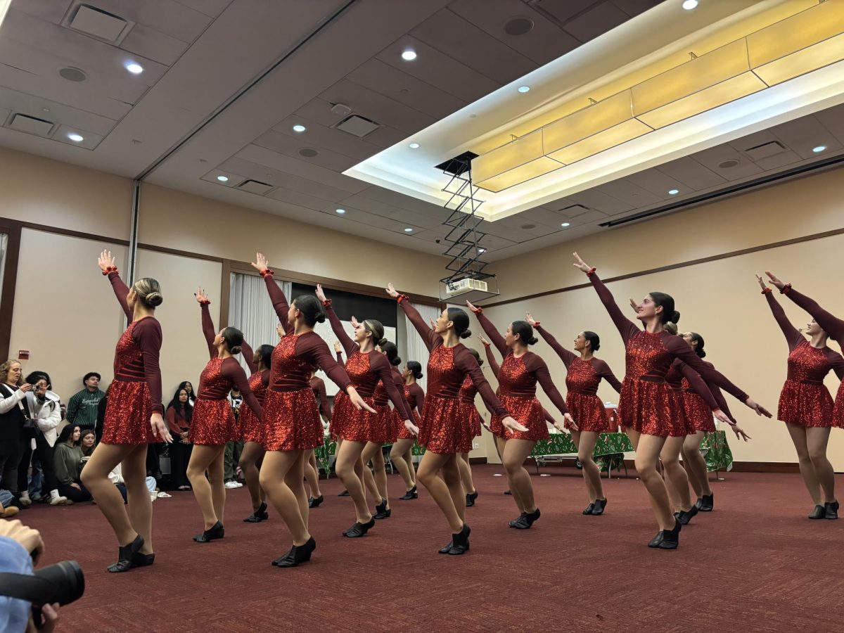 The Stormettes Kickline team performed at the Dec. 9 event. 
Torch Photo / Isabella Athanasiou