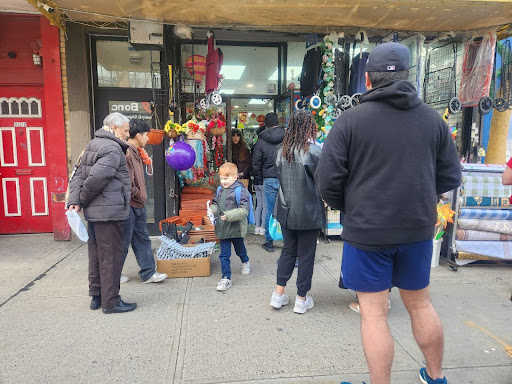 Queens residents at an Astoria 99 cent store.
Torch Photo/Malak Kassem 

